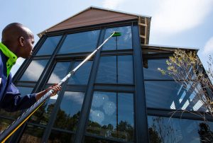 Man Cleaning Windows in Folsom Ca